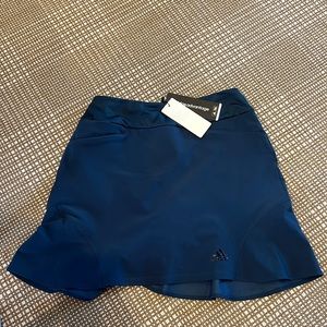 Navy blue adidas skirt size extra small.